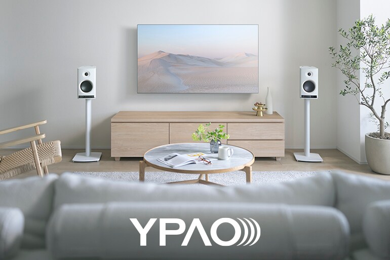 The NX-70A placed in front and the YPAO logo