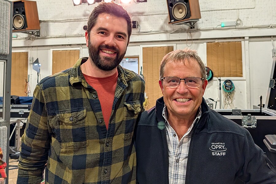 Kevin “Sarge” McGinty and Brady Reuter standing together during the Opry 100 London production.